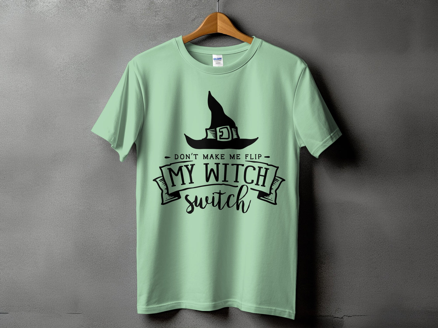 Light green t-shirt with a witch hat and "My Witch Switch" text.