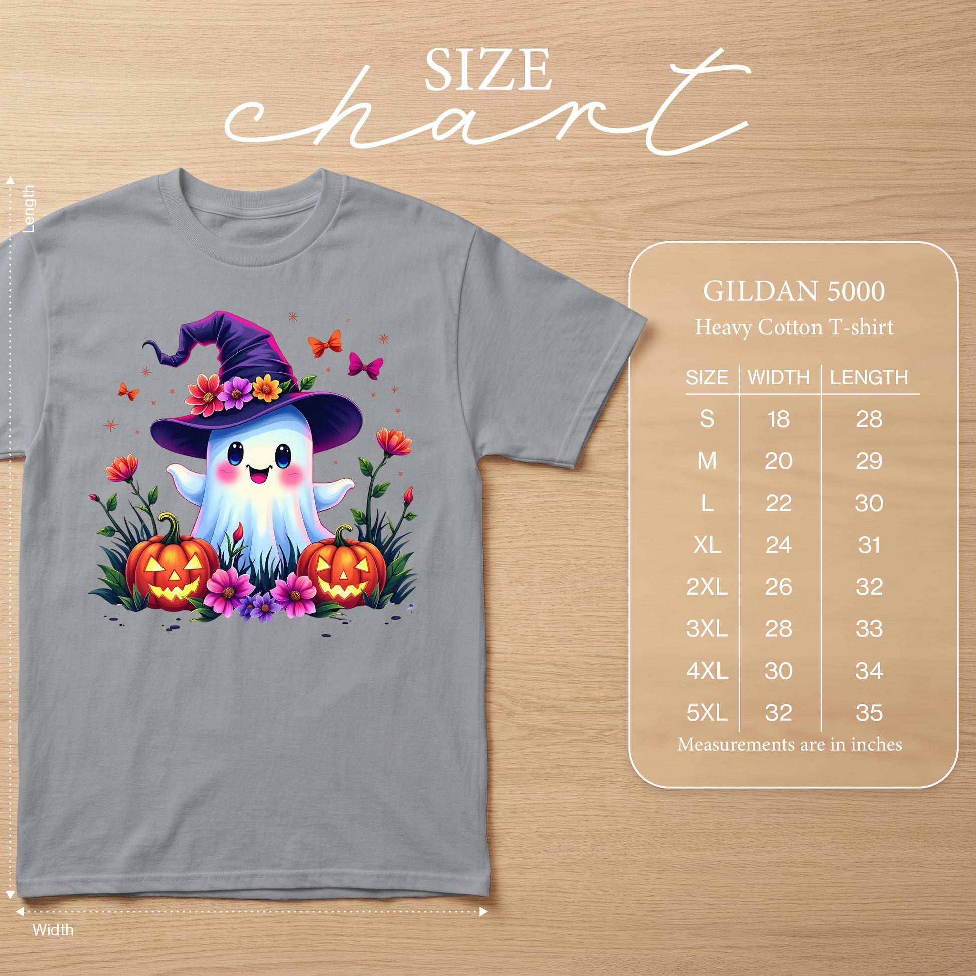 Gray t-shirt featuring a cartoon ghost in a witch hat with pumpkins and flowers. Size chart provided.