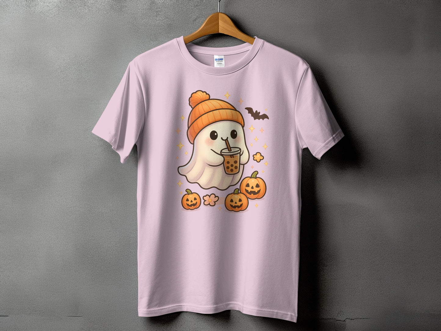 Ghost with boba drink, pumpkins, and bat on pink t-shirt