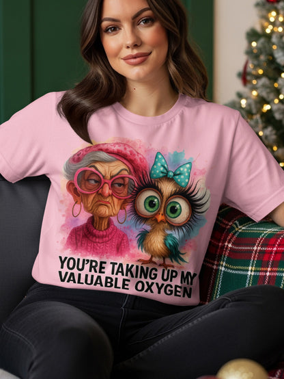 Pink t-shirt with cartoon owl and grumpy grandma saying "You're taking up my valuable oxygen."