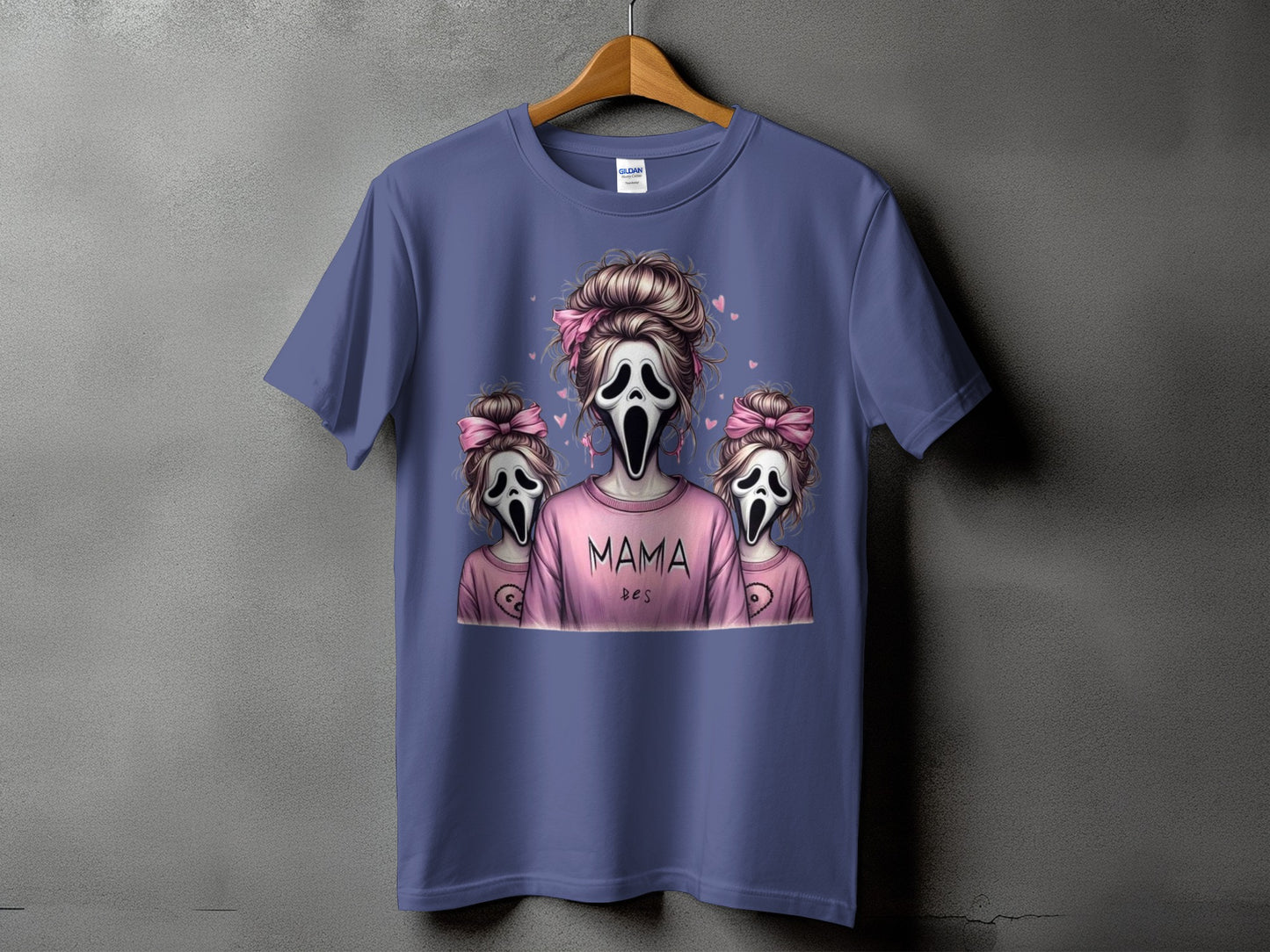 T-shirt with three screaming ghost figures, "MAMA" text, and pink bows.