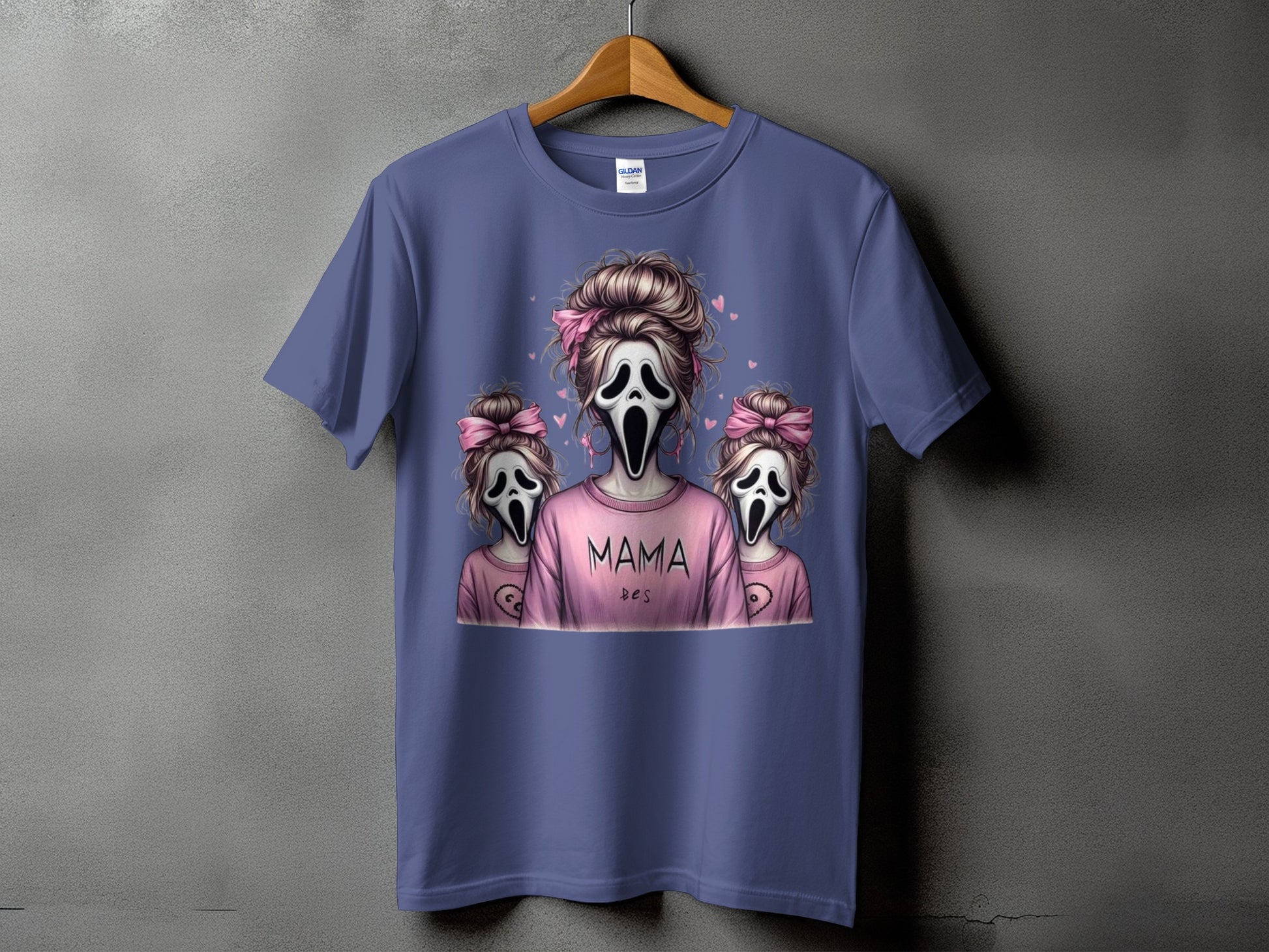 T-shirt with three screaming ghost figures, "MAMA" text, and pink bows.