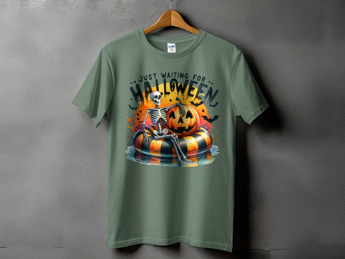 Skeleton with pumpkin floats on a ring, text says "Just Waiting for Halloween."