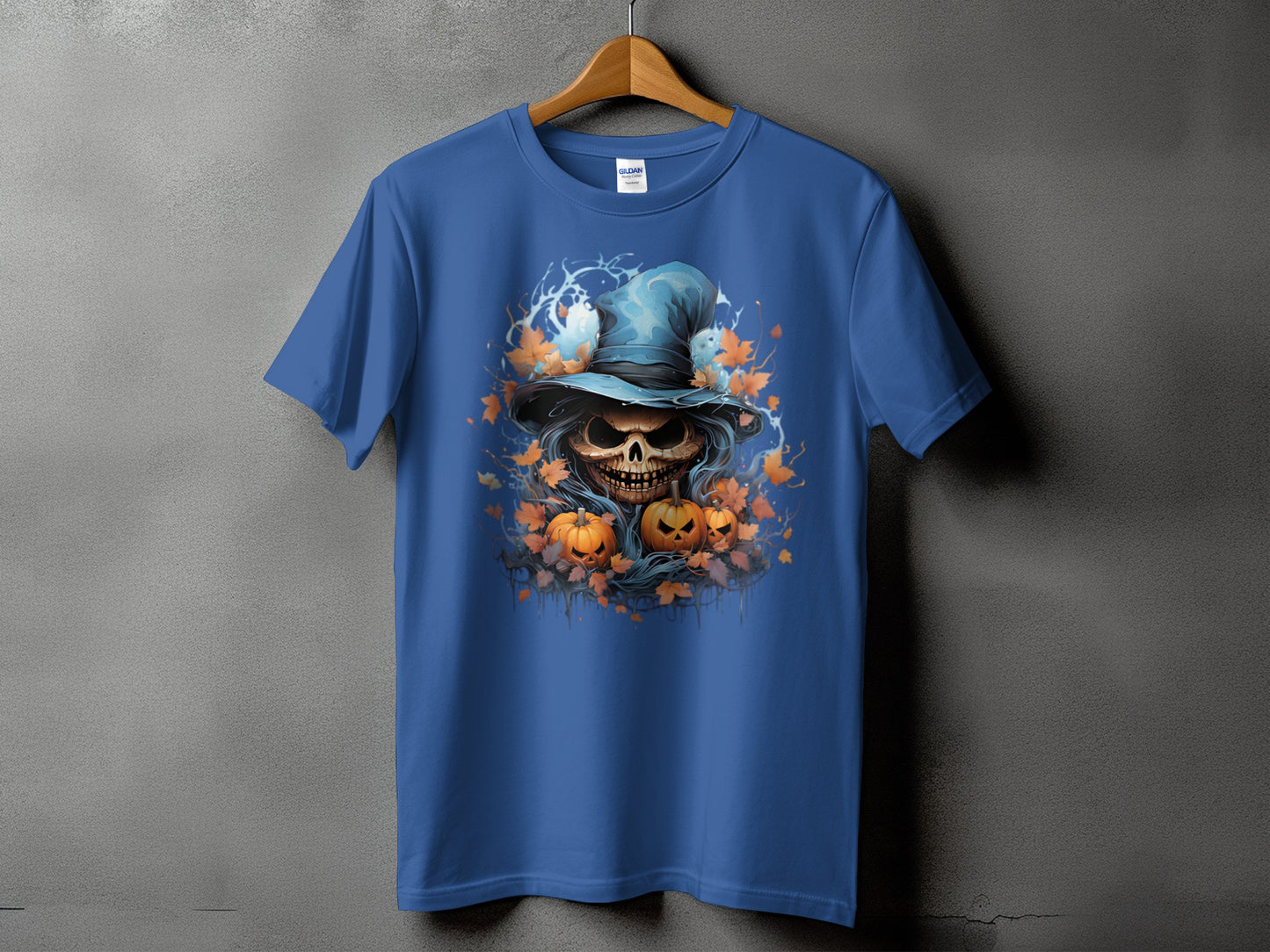 Blue t-shirt with Halloween skull, pumpkins, and autumn leaves graphic.