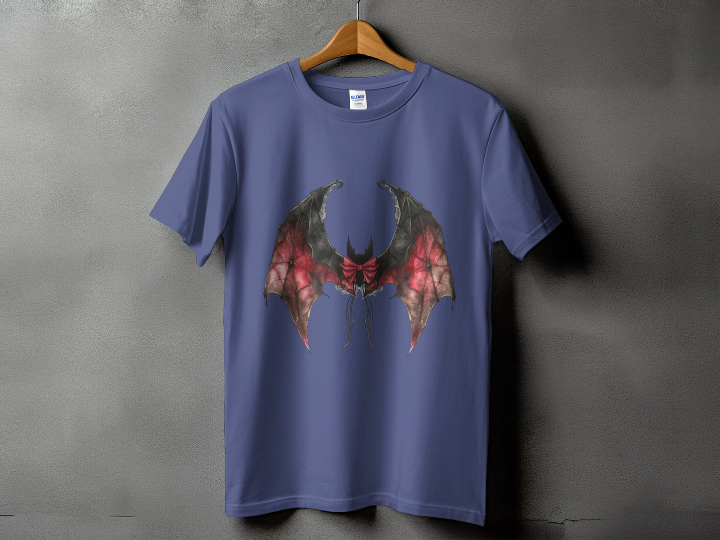 Purple t-shirt with gothic bat wings and red bow graphic design.