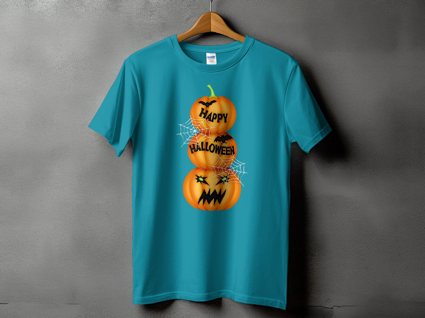 Teal t-shirt with stacked pumpkins and text reading "Happy Halloween."