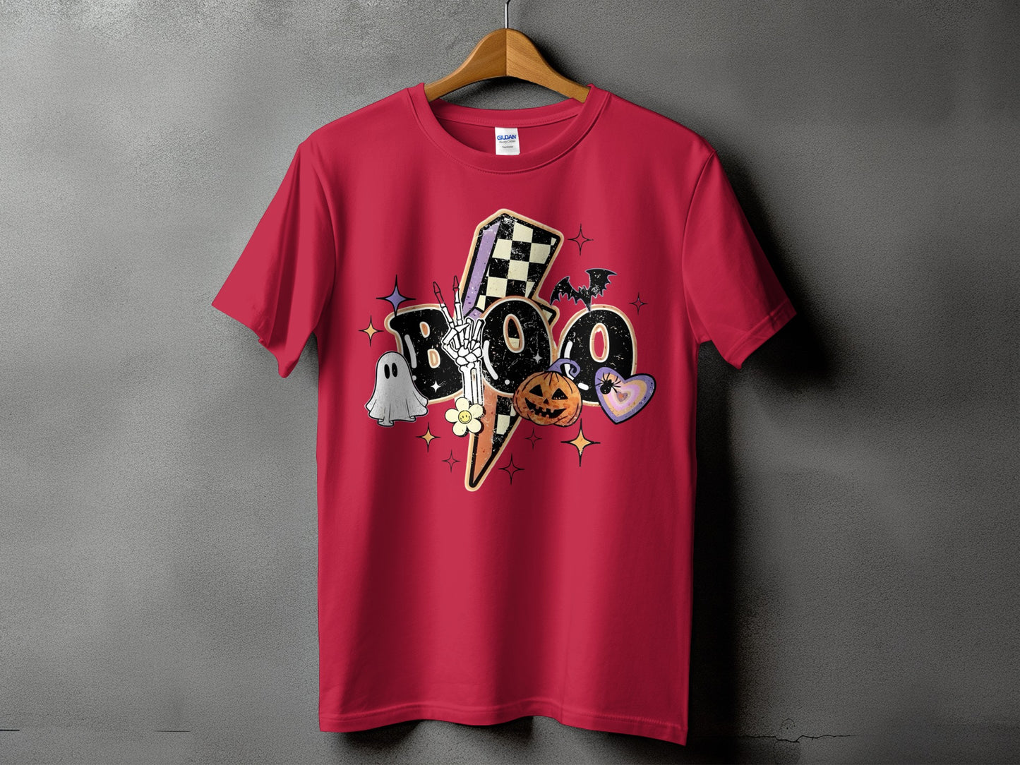 Red t-shirt with "BOO" graphic featuring Halloween icons and a lightning bolt.