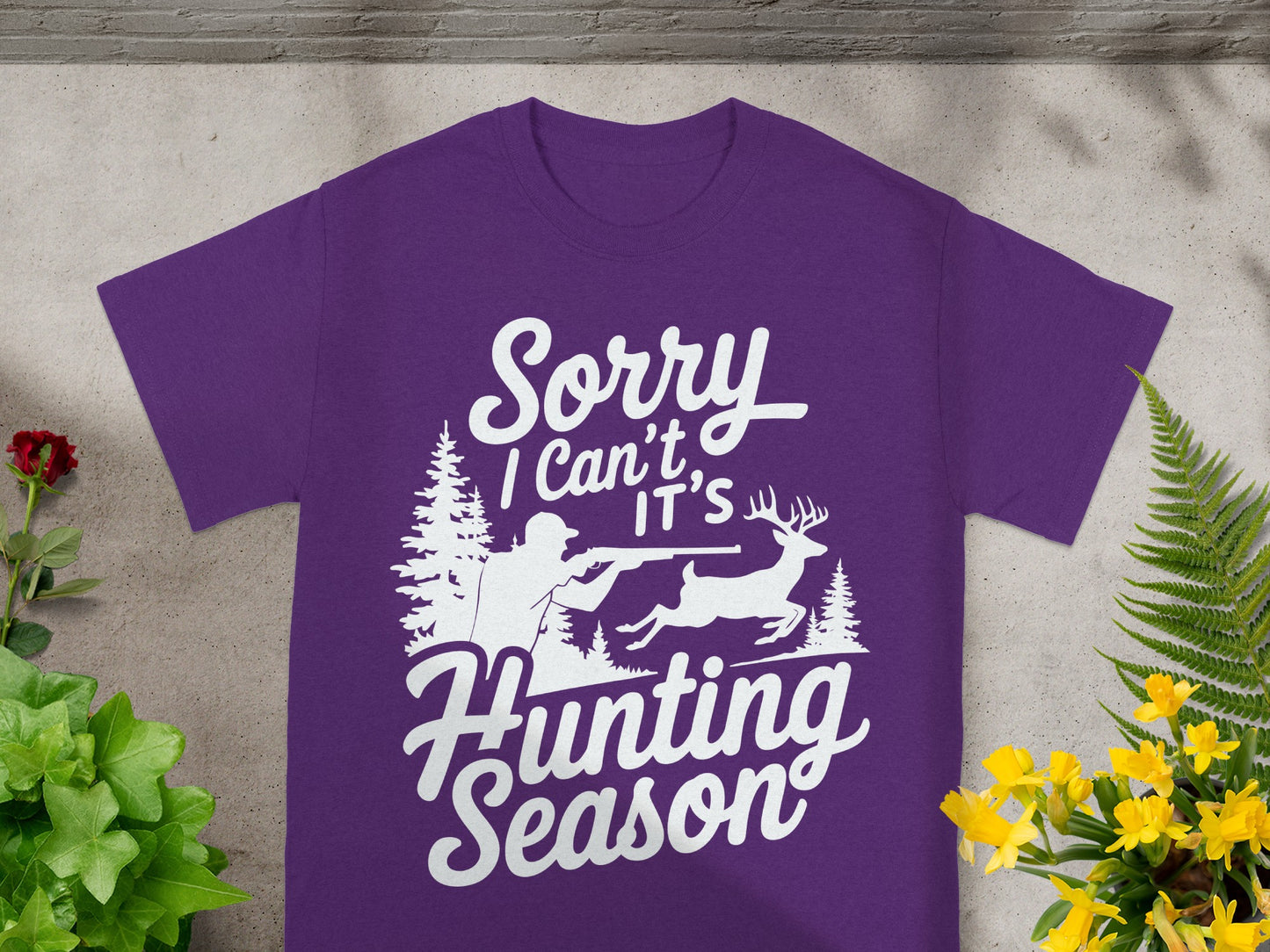 Purple t-shirt with white graphic: "Sorry I Can't It's Hunting Season"