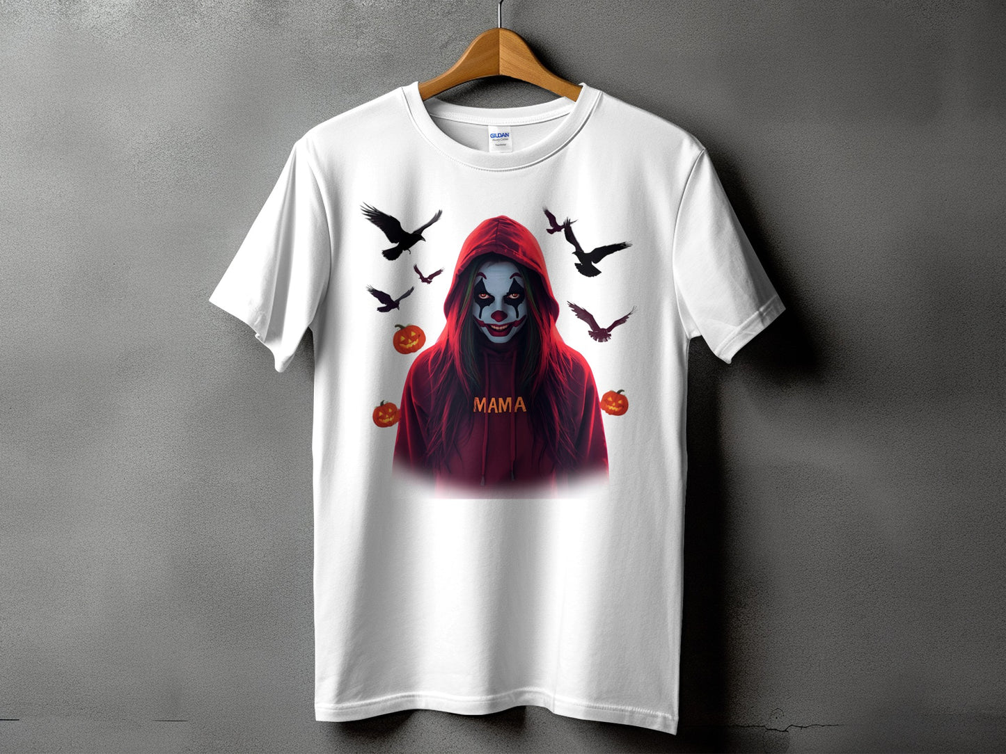 White t-shirt with a spooky clown design, flying birds, and pumpkins.