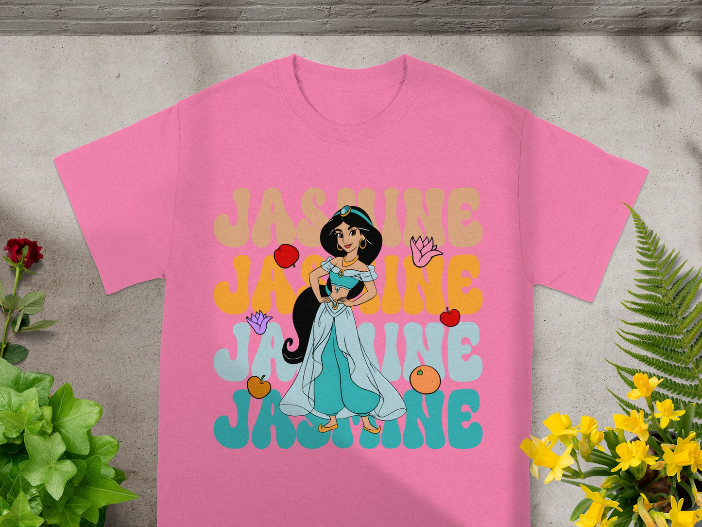 Pink t-shirt with Princess Jasmine graphic and text.