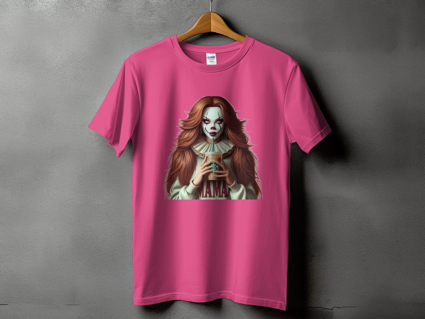 Pink t-shirt with clown-like woman and "Mama" text graphic.