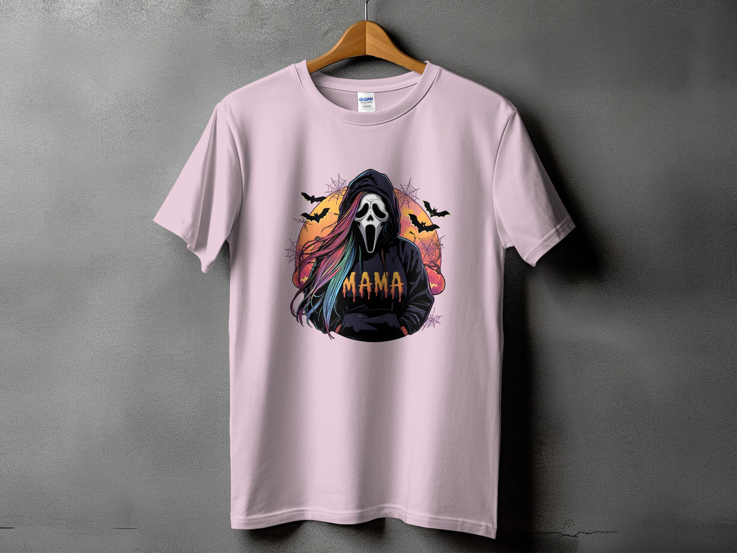 Pink t-shirt with Ghostface and "Mama" text, bats, and pumpkins.