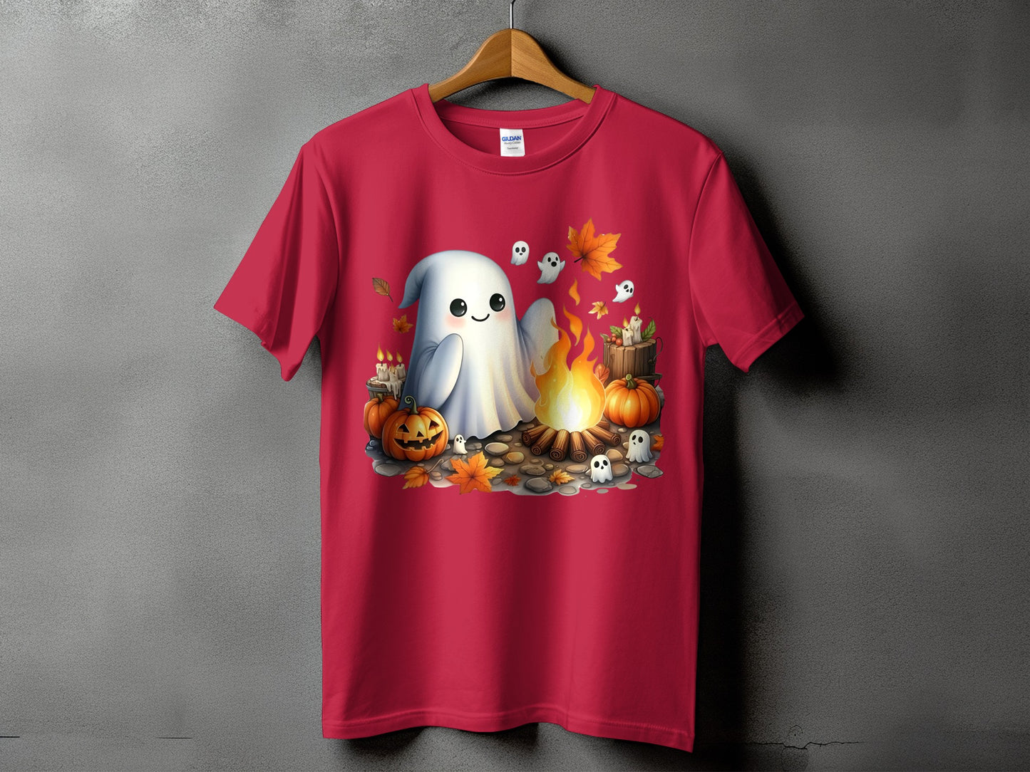 Red t-shirt with a Halloween graphic featuring a ghost, pumpkins, campfire, and candles.