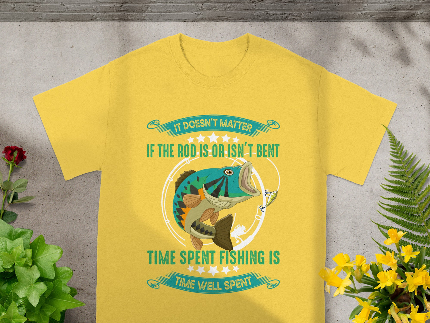 Yellow t-shirt with a graphic of a bass, fishing lure, and text about fishing.