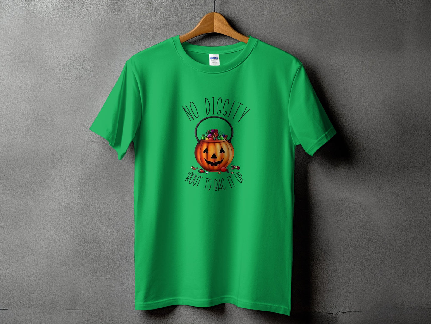 Green t-shirt with Halloween pumpkin, candy, and "No Diggity 'Bout To Bag It Up" text.