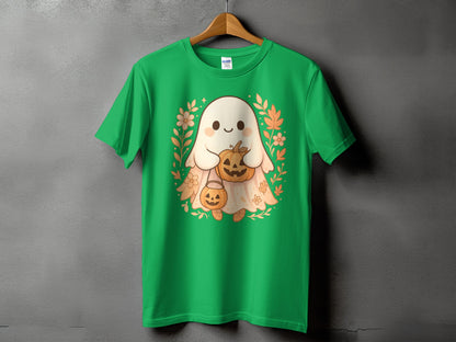 Green t-shirt with a cute ghost holding pumpkins and surrounded by fall leaves.