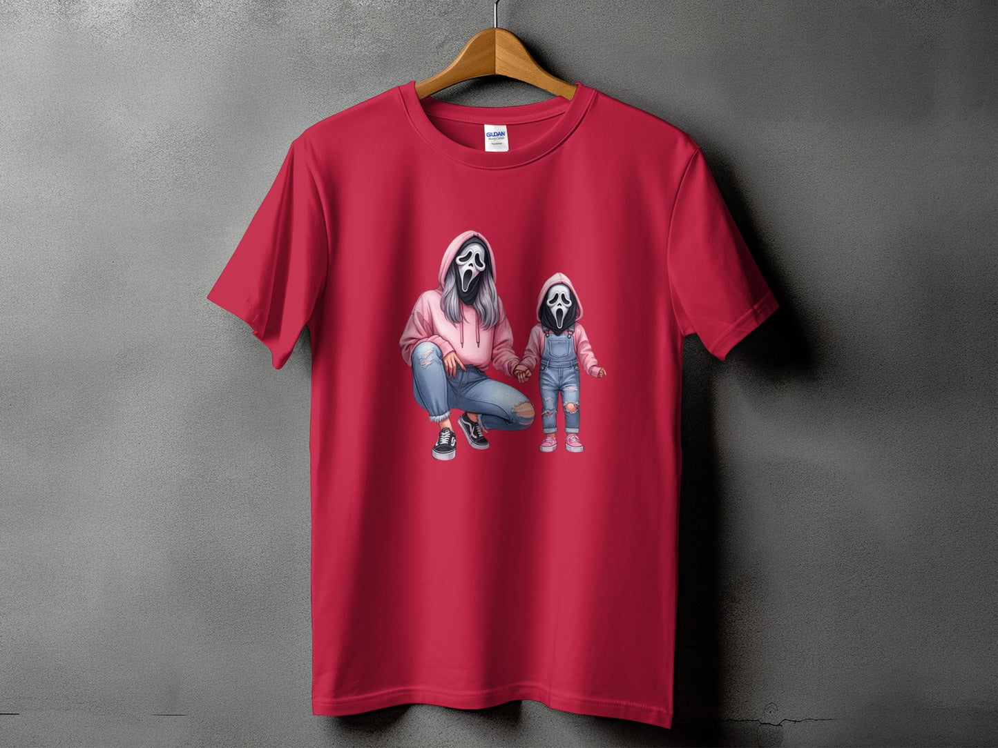 Red t-shirt with ghost face graphic of adult and child holding hands.