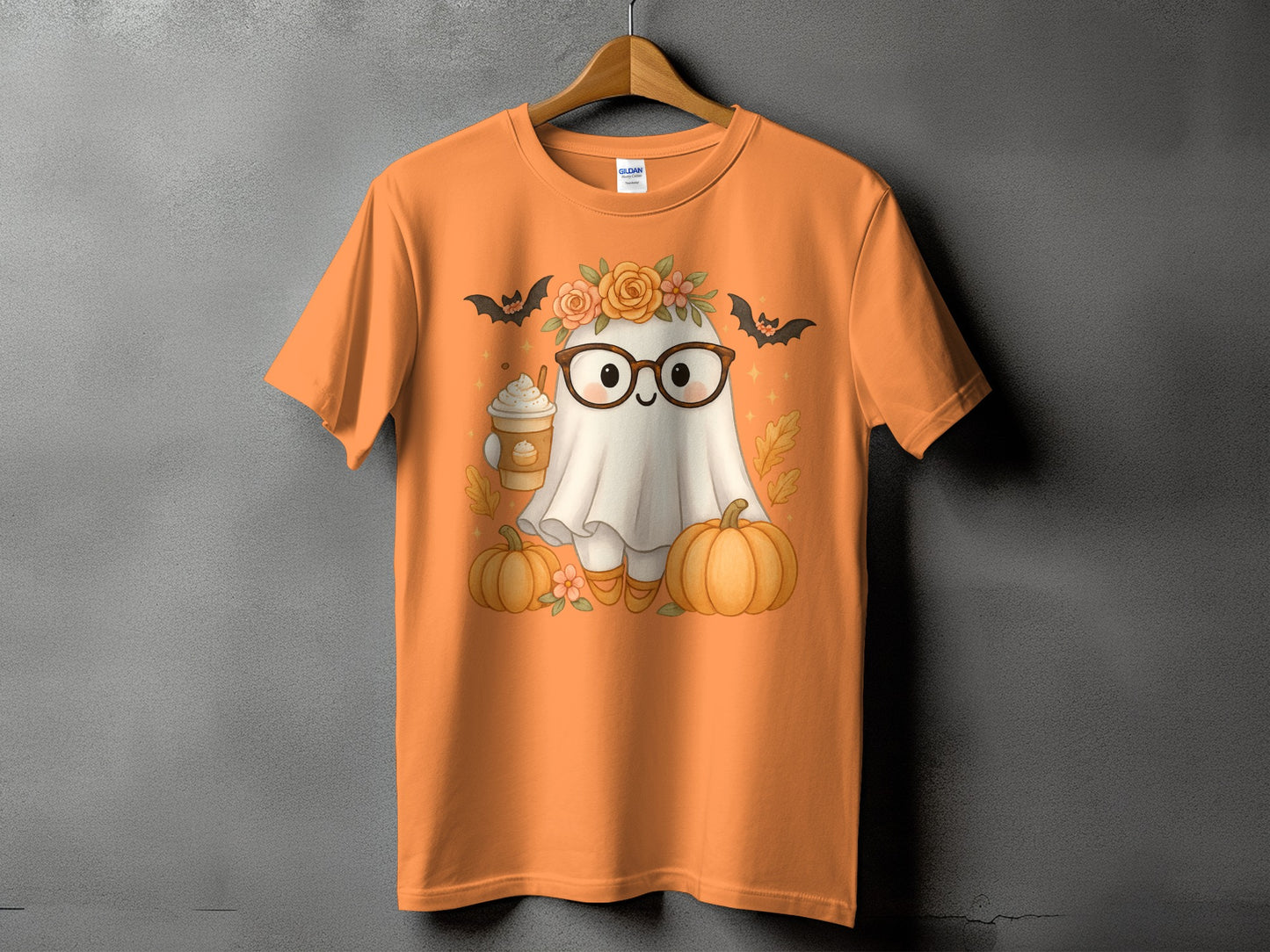 Orange t-shirt with a cute ghost wearing glasses and holding a pumpkin spice latte.