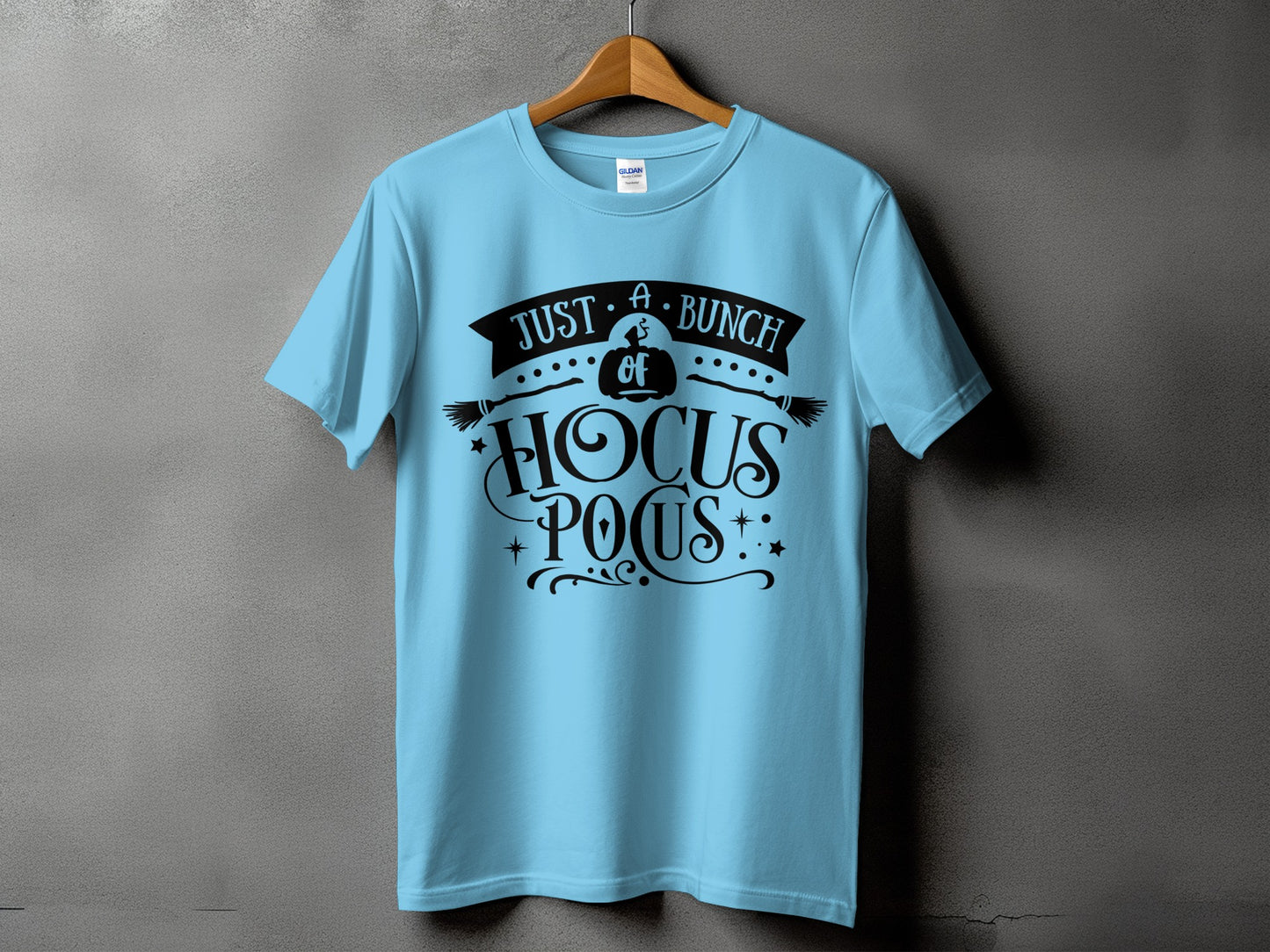 Light blue t-shirt with "Just A Bunch of Hocus Pocus" graphic.