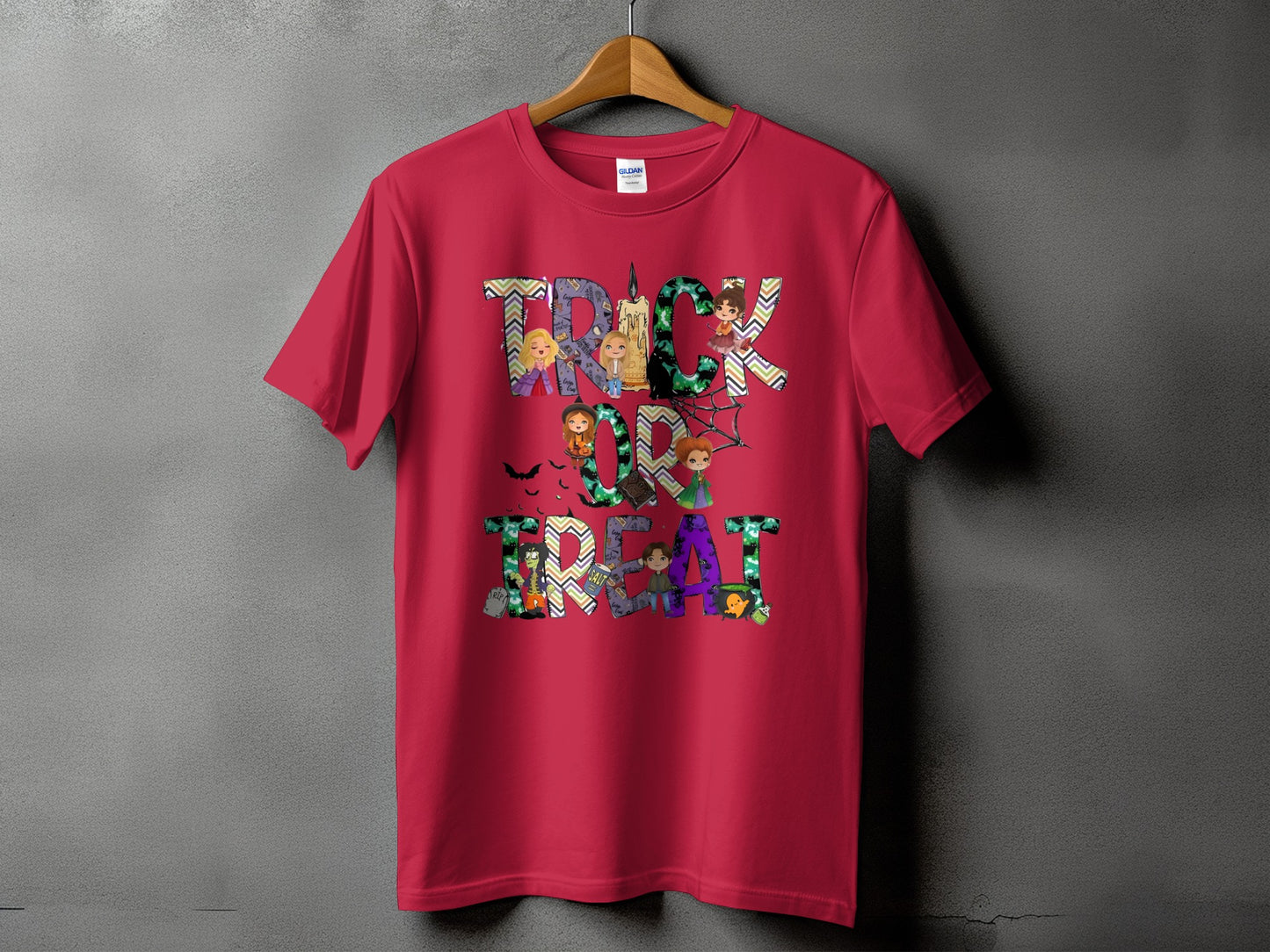 Red t-shirt with "Trick or Treat" Halloween graphic featuring cartoon characters and spooky elements.