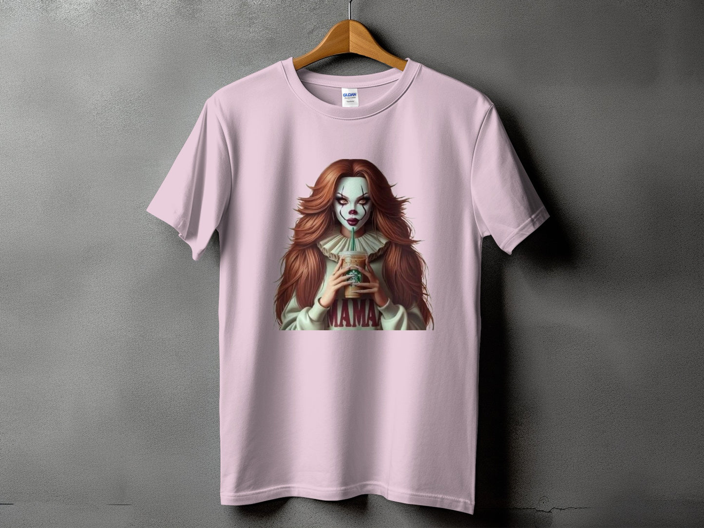 Pink t-shirt with graphic of a clown woman holding a coffee cup, "MAMA" text.