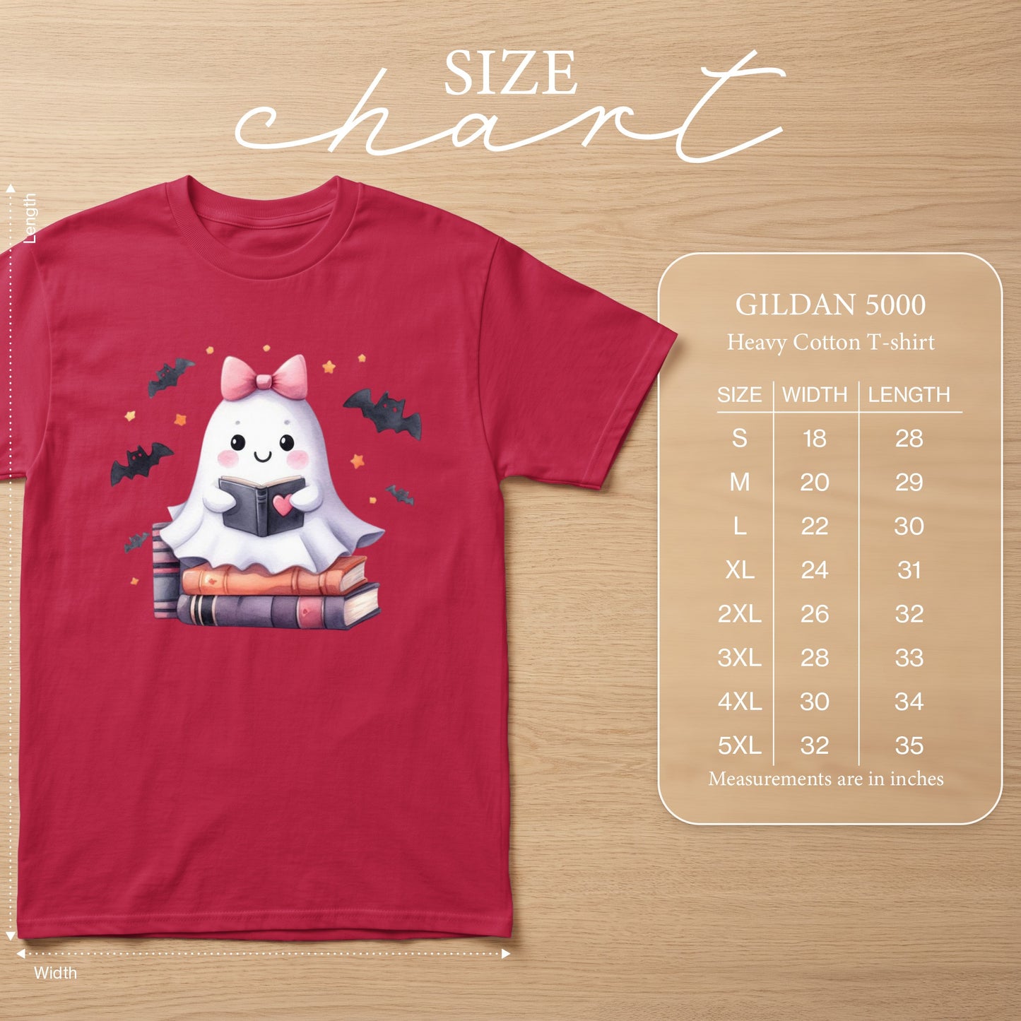 Red t-shirt with a cartoon ghost reading a book on stacked books. Includes size chart.