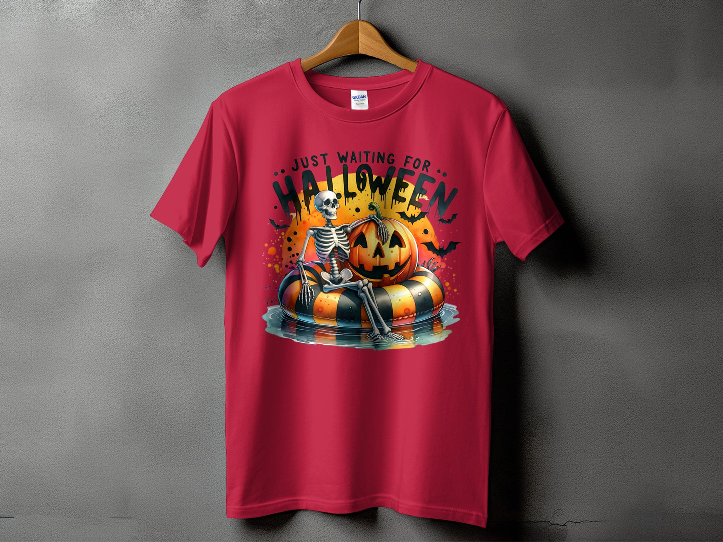 Red t-shirt with skeleton, pumpkin, and text "JUST WAITING FOR HALLOWEEN".