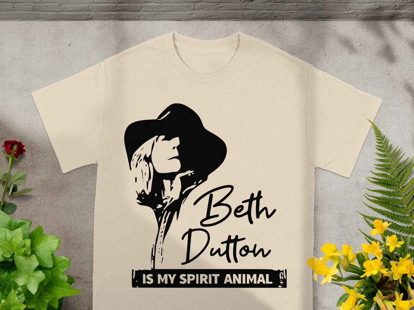 T-shirt with black graphic of Beth Dutton and "IS MY SPIRIT ANIMAL" text.