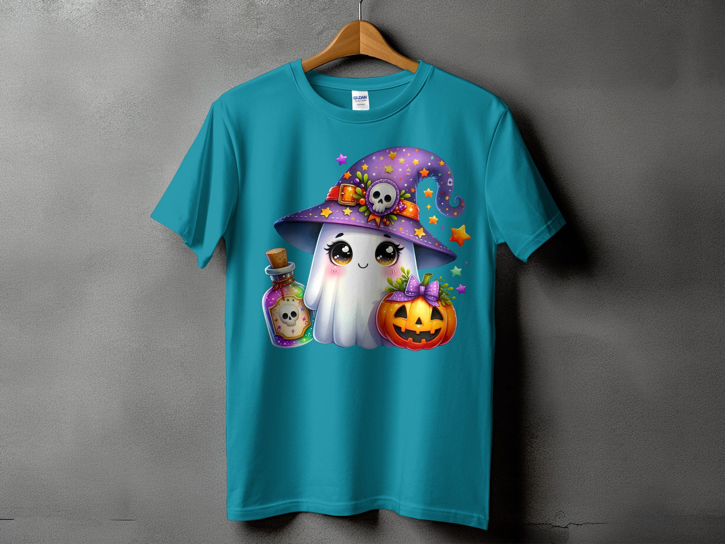 Teal t-shirt with a kawaii ghost wearing a witch hat, holding a potion bottle and pumpkin.