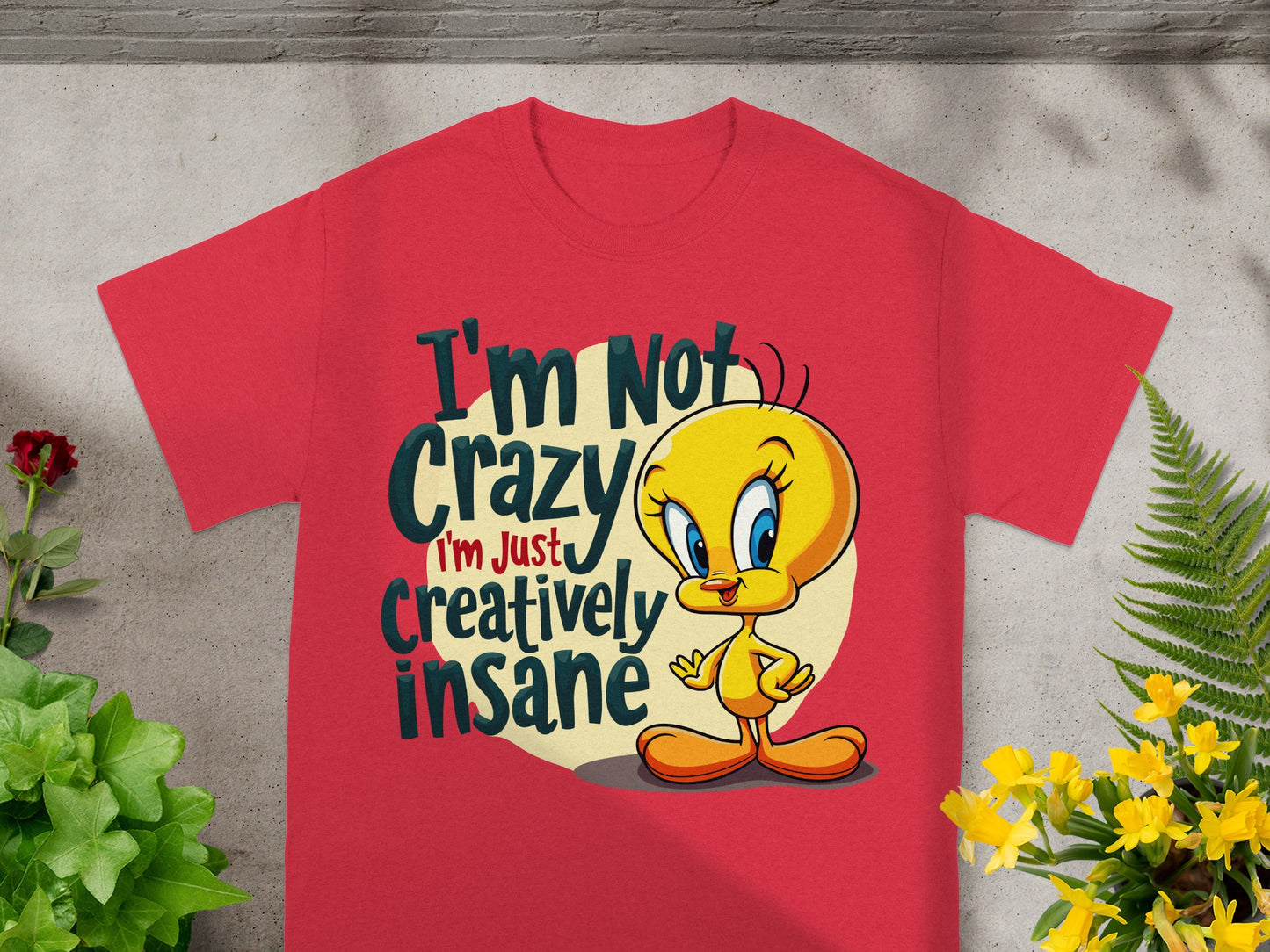Red t-shirt with Tweety Bird graphic and "I'm Not Crazy I'm Just Creatively Insane" text.