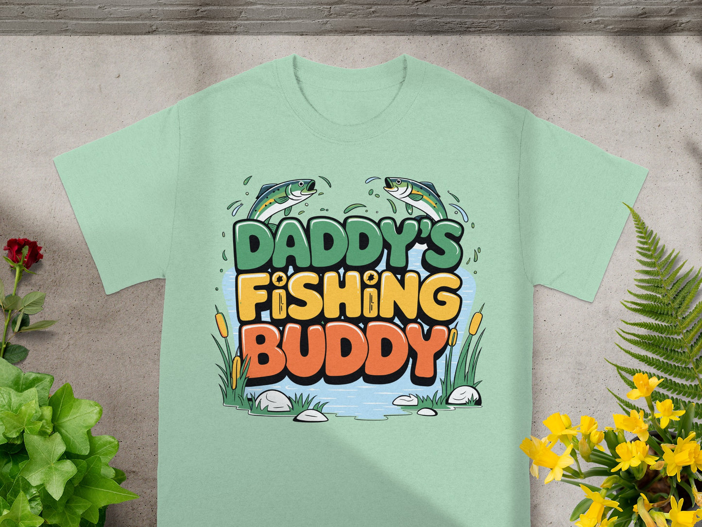 Mint green t-shirt with "Daddy's Fishing Buddy" text and cartoon fish.