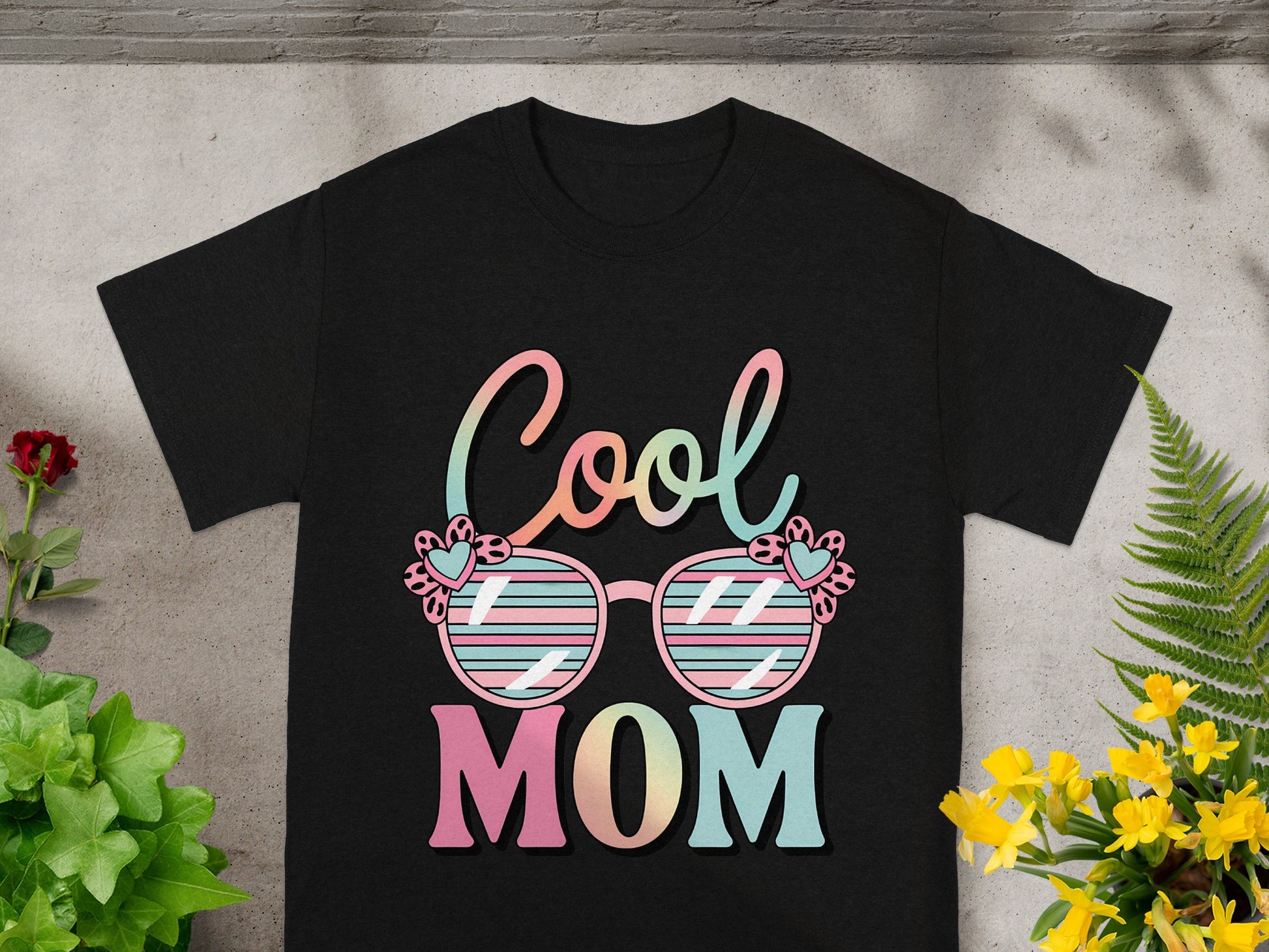 Black t-shirt with "Cool MOM" text and retro sunglasses graphic.