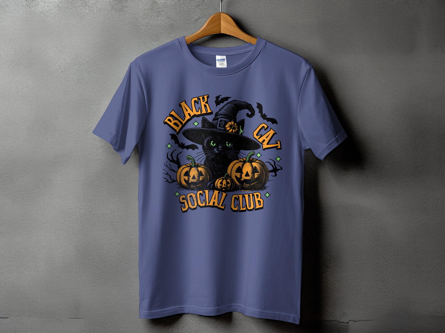 T-shirt with "Black Cat Social Club" text, black cat, pumpkins, and bats.