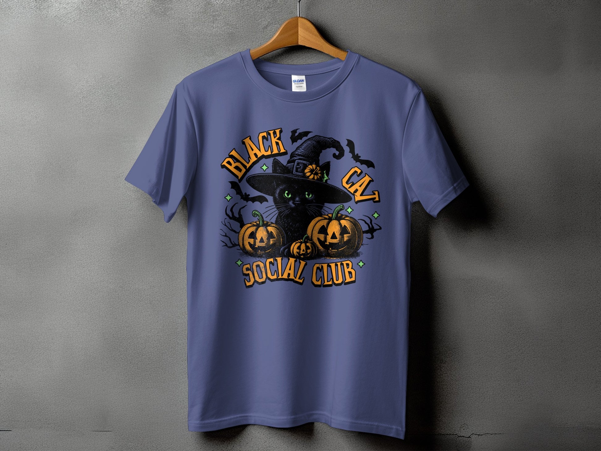 T-shirt with "Black Cat Social Club" text, black cat, pumpkins, and bats.