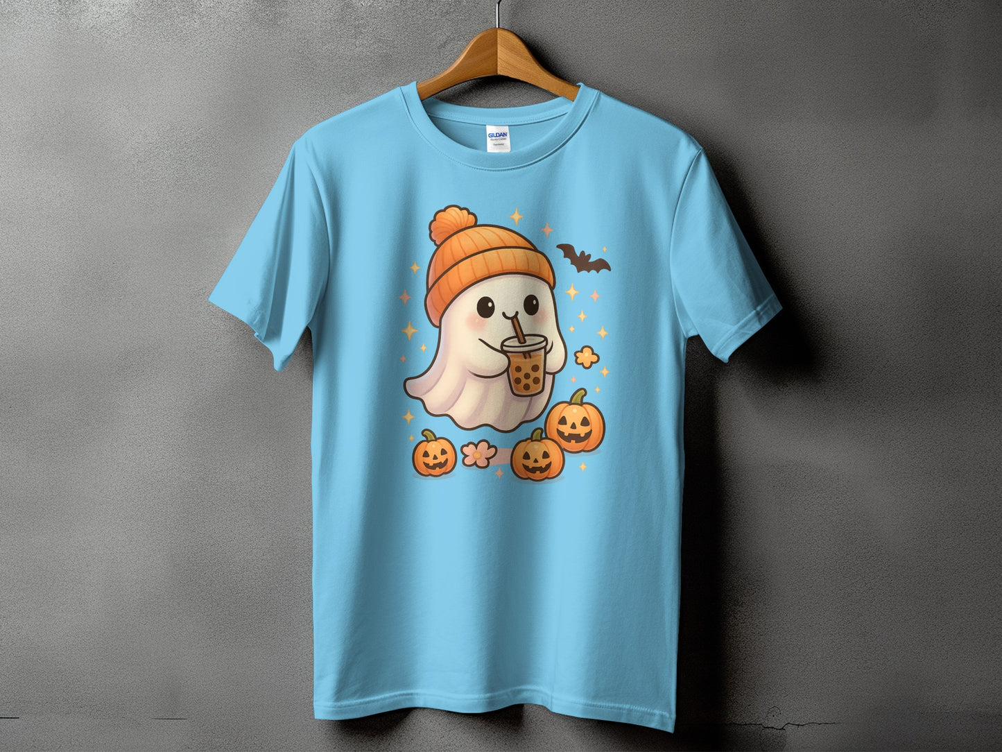 Cute ghost in orange beanie drinking bubble tea with pumpkins and bat.