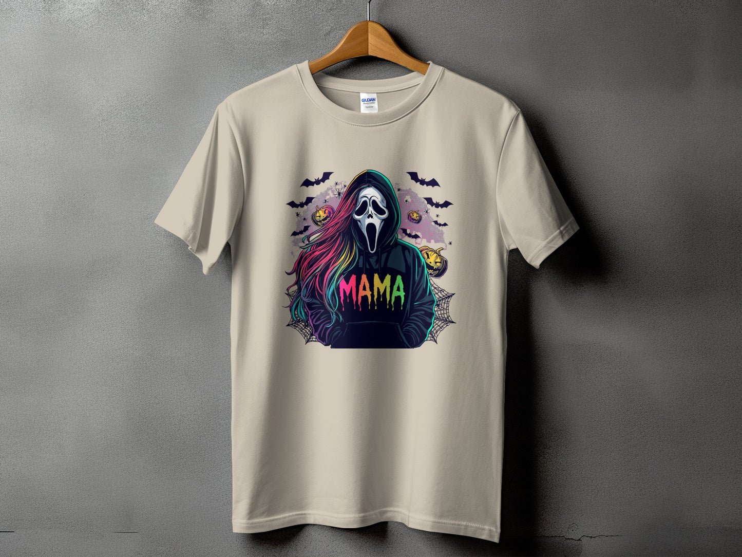 Light tan t-shirt with ghost face, colorful hair, and "MAMA" text.