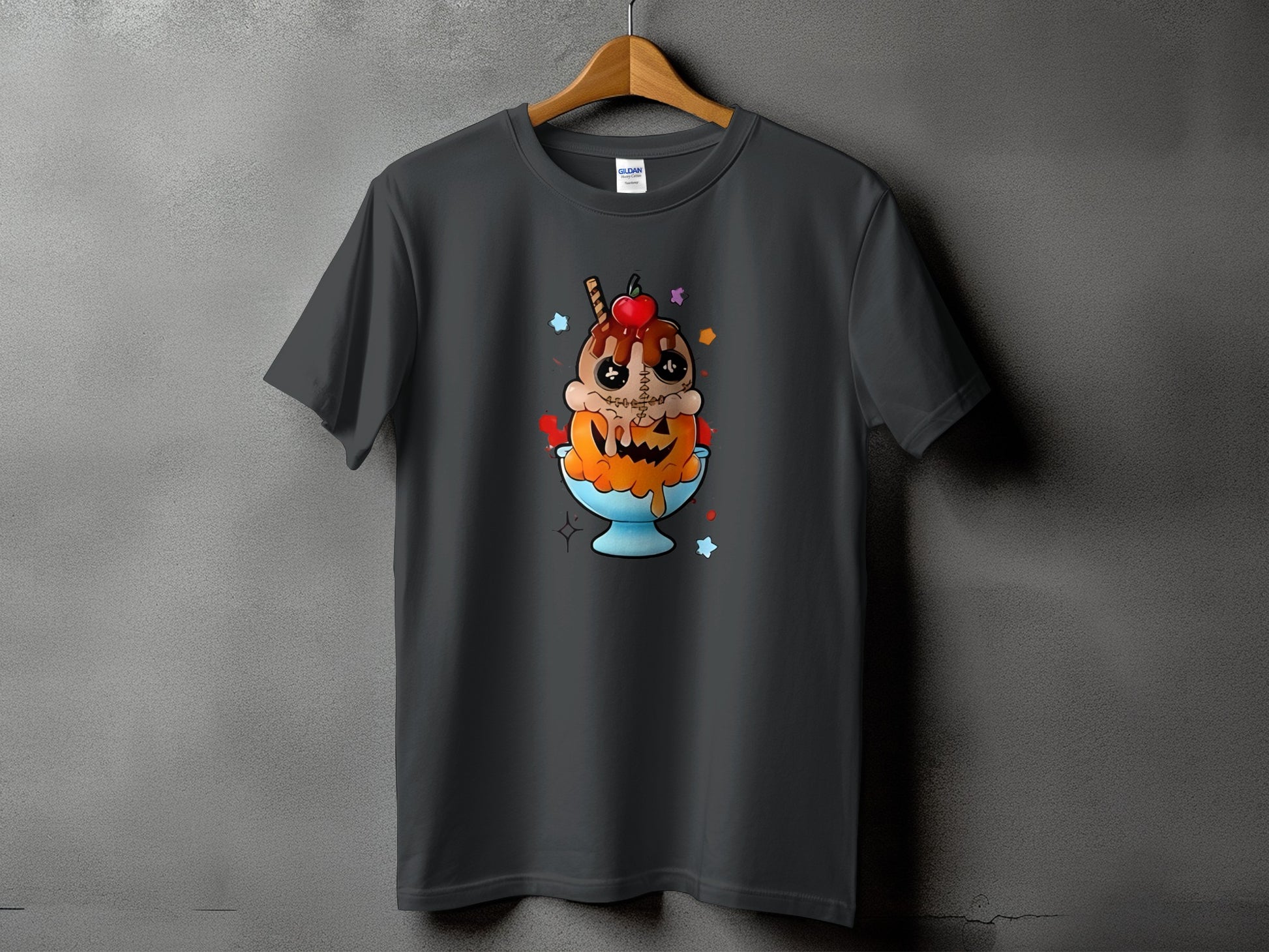 Dark gray t-shirt featuring a cartoon ice cream sundae with a jack-o'-lantern face.