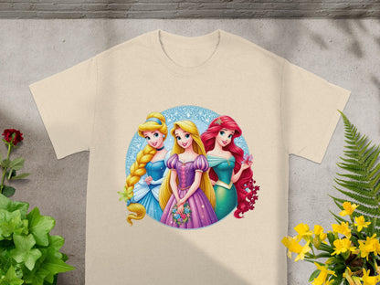Three Disney princesses: Cinderella, Aurora, and Ariel, on a light tan t-shirt.