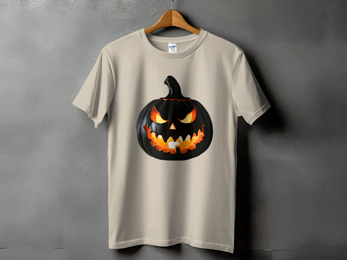 Light beige t-shirt with a scary black jack-o'-lantern graphic.