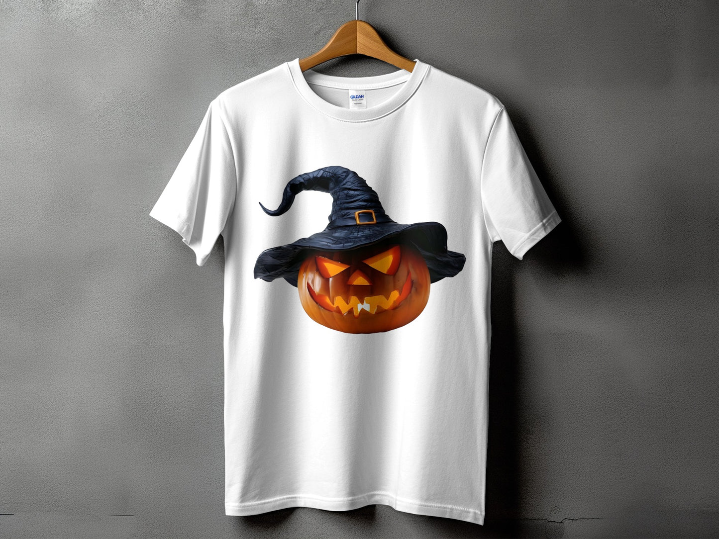 White t-shirt with a jack-o'-lantern wearing a black witch hat graphic.