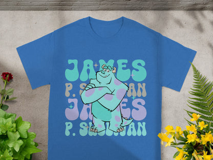 Blue t-shirt with "James P. Sullivan" text in stylized fonts.