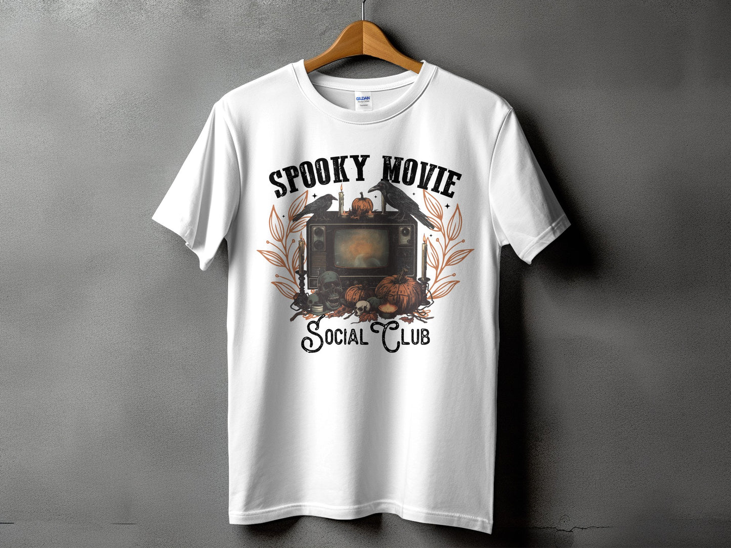 White t-shirt with "Spooky Movie Social Club" text and Halloween graphic.
