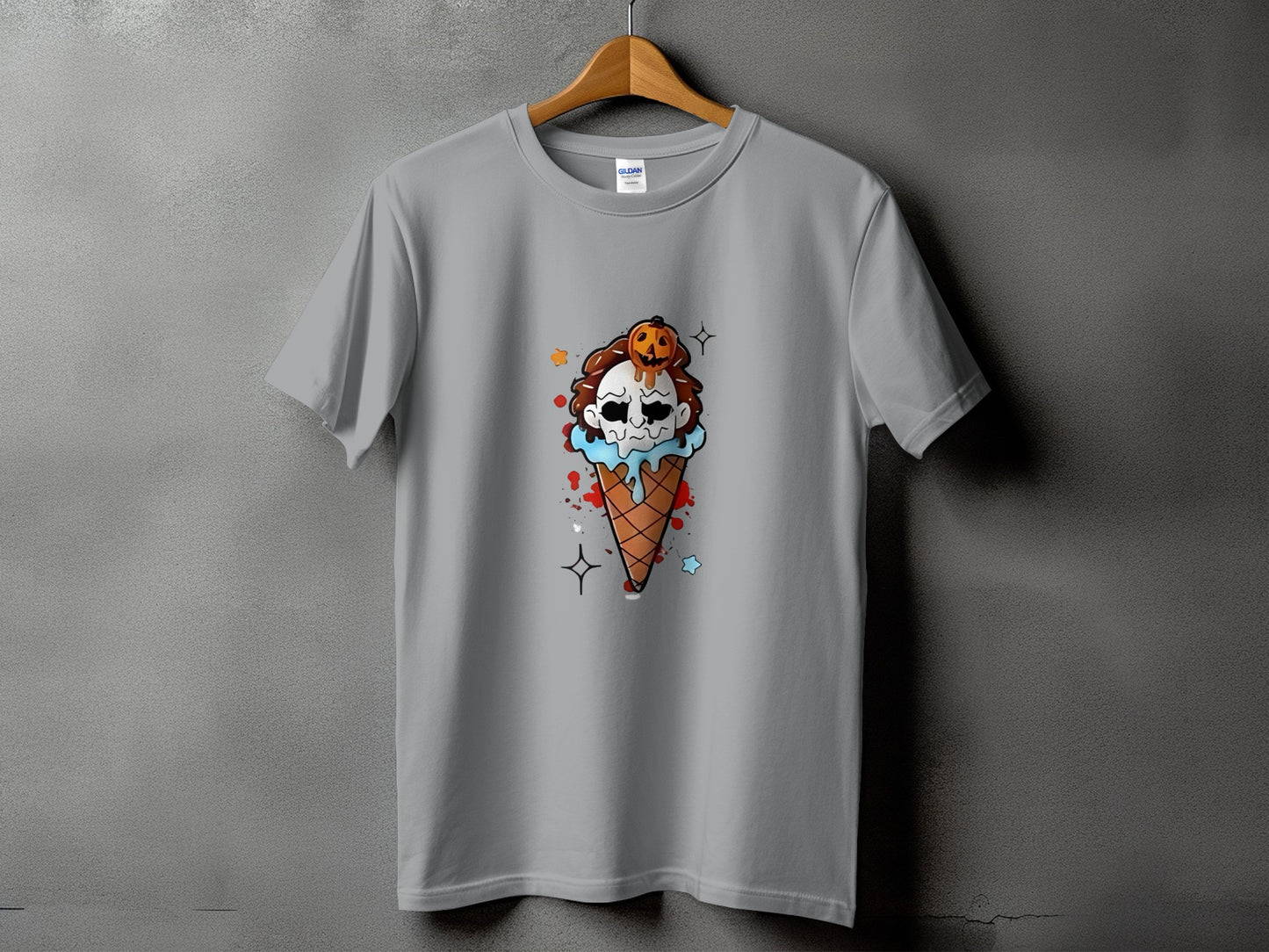 Grey t-shirt with a Halloween ice cream cone graphic featuring a skull and pumpkin.