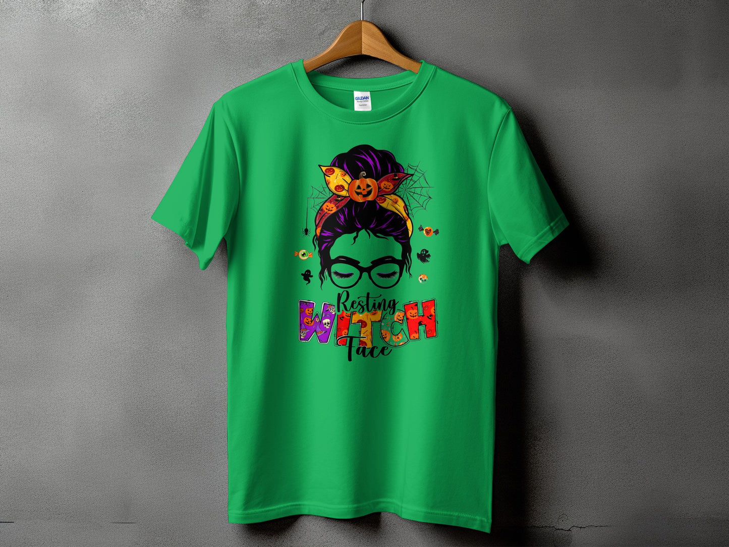 Green t-shirt with "Resting Witch Face" Halloween graphic.