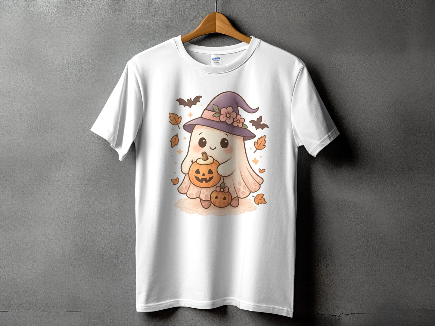 Cute ghost with witch hat holding pumpkins on white t-shirt.