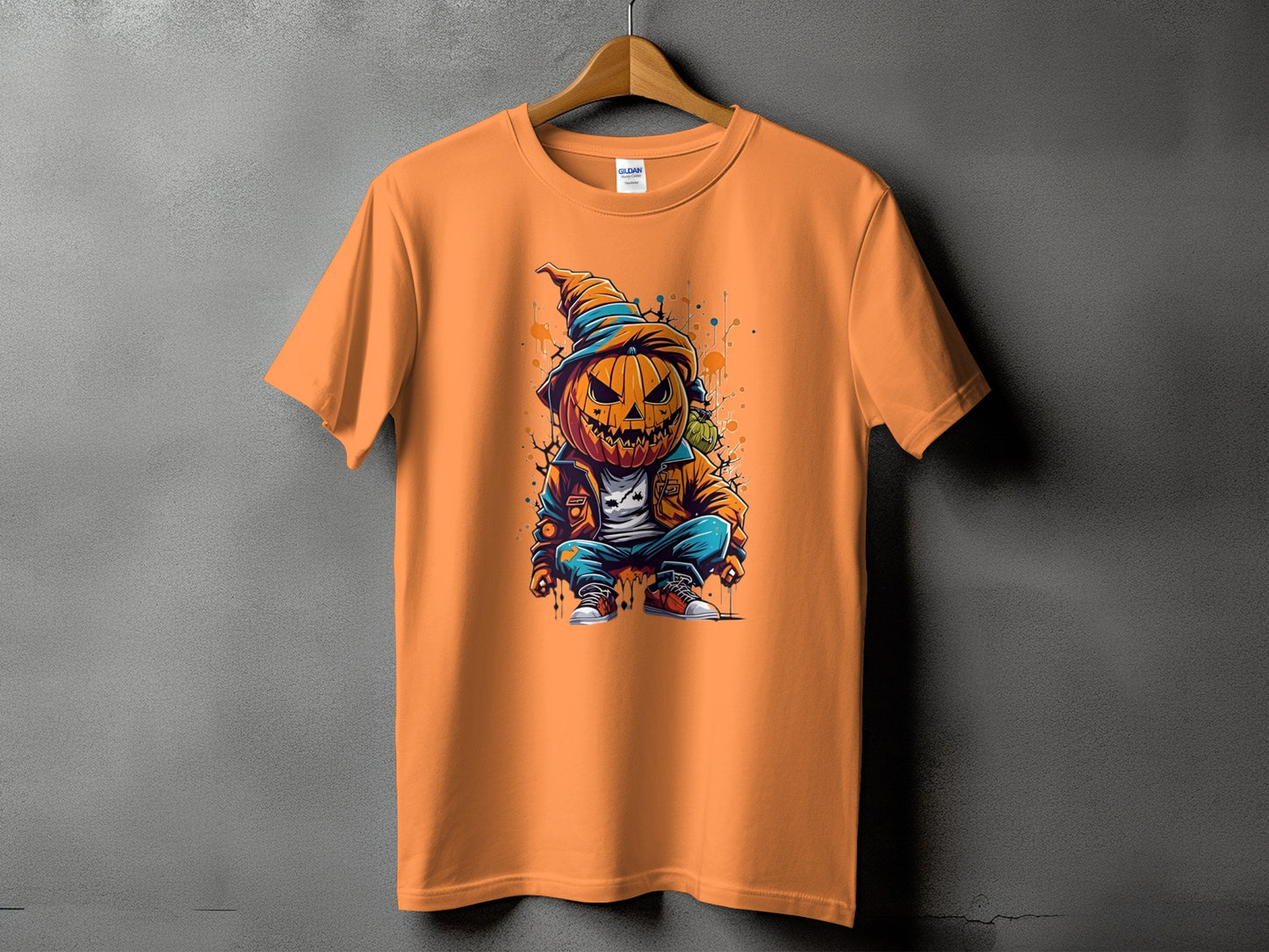 Orange t-shirt with a cartoon jack-o'-lantern character in streetwear.