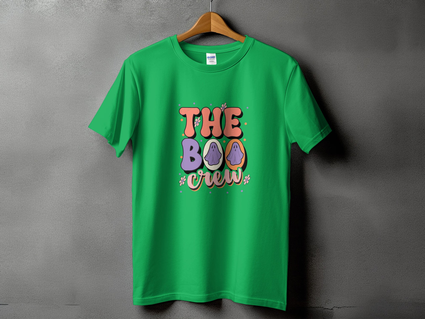 Green t-shirt with "The Boo Crew" text and purple ghosts.