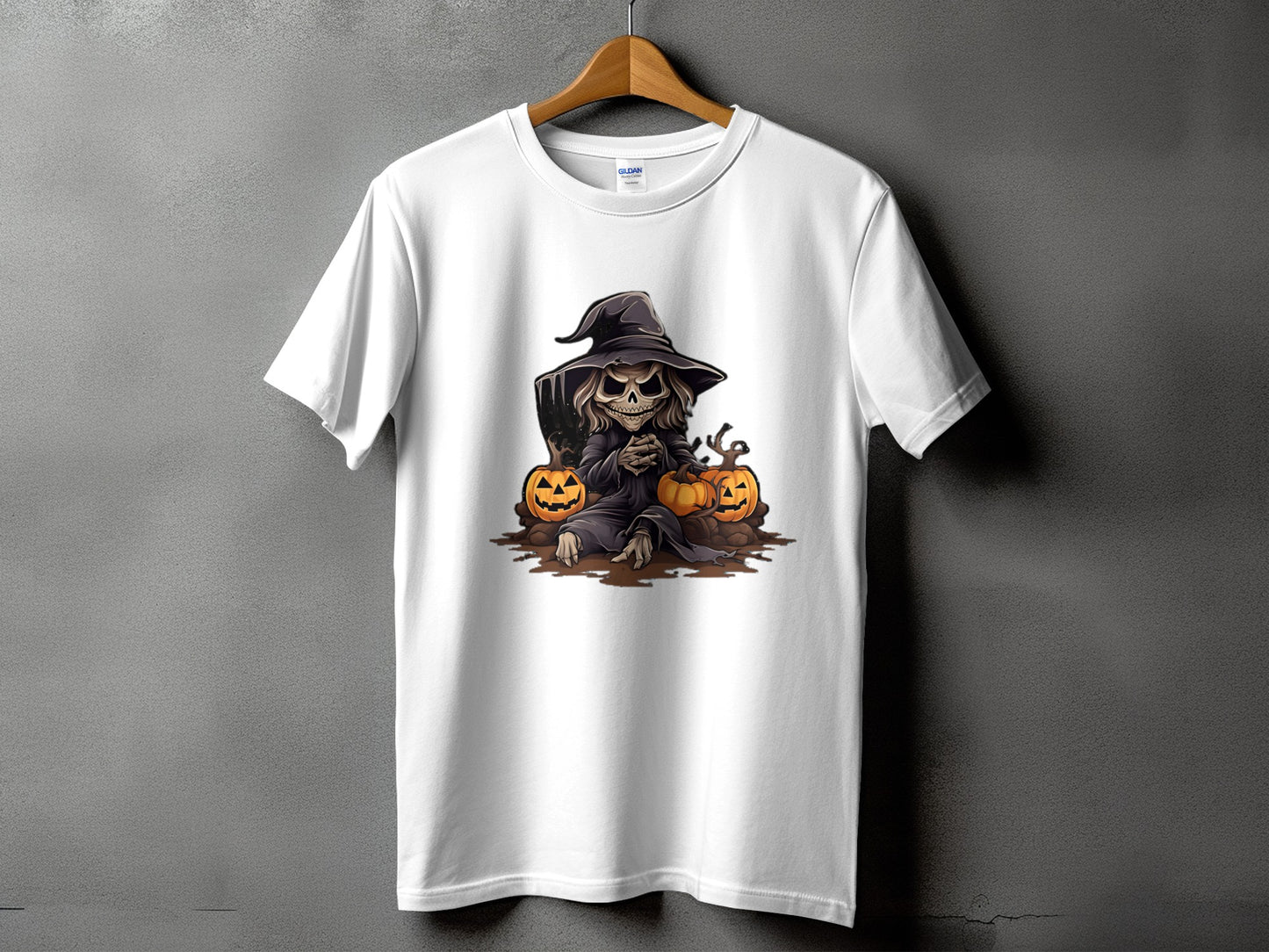 White t-shirt with a spooky Grim Reaper graphic featuring pumpkins and a tombstone.