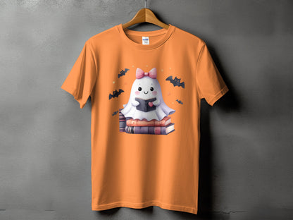Orange t-shirt with a cute ghost reading a book surrounded by bats.