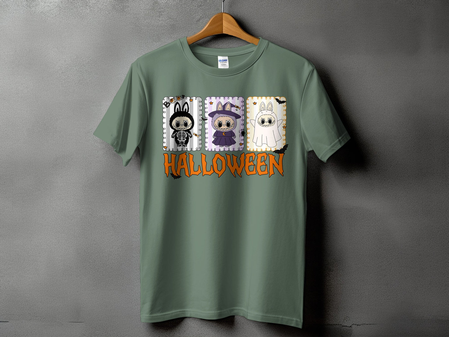 T-shirt with three cartoon characters in Halloween costumes and the word "HALLOWEEN" below.
